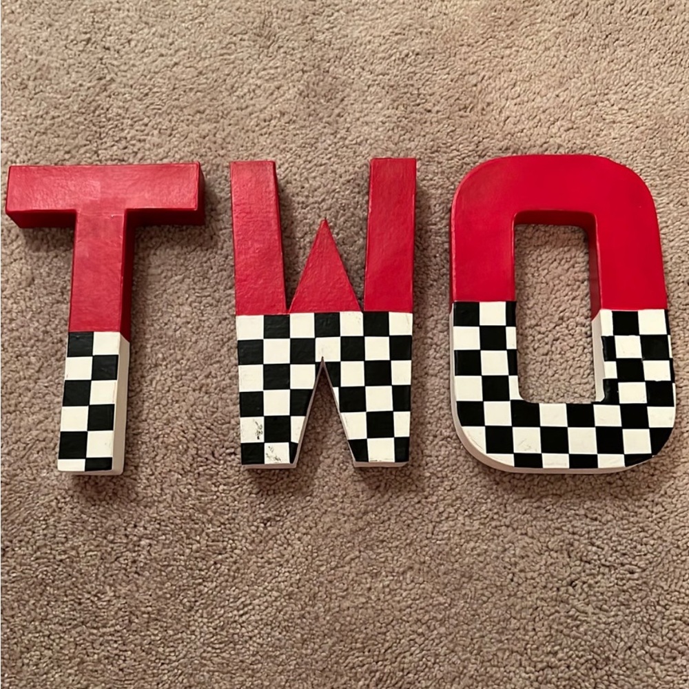 Two race car decorations